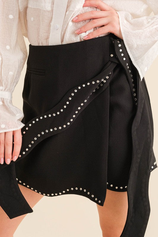 Black rhinestone accented mini skirt